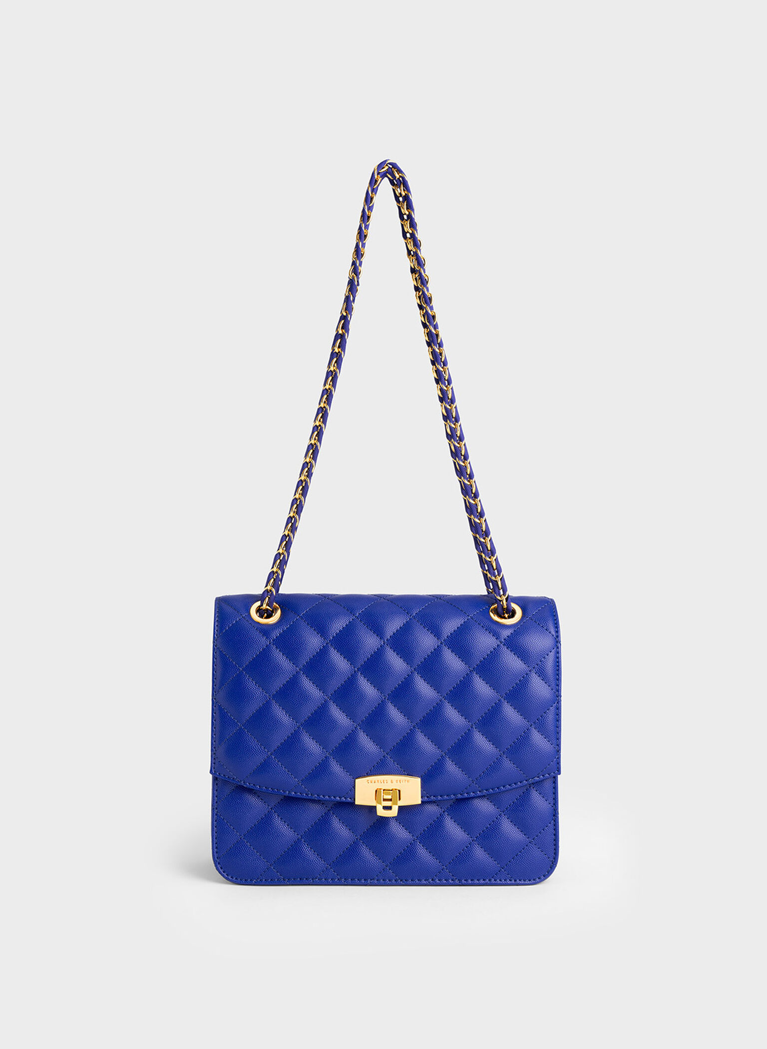 Cobalt Quilted Chain Strap Clutch - CHARLES & KEITH US