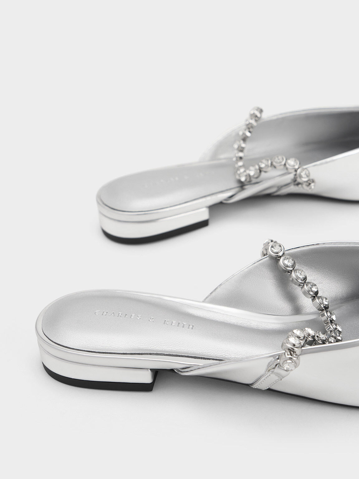 Silver flat mules 2025