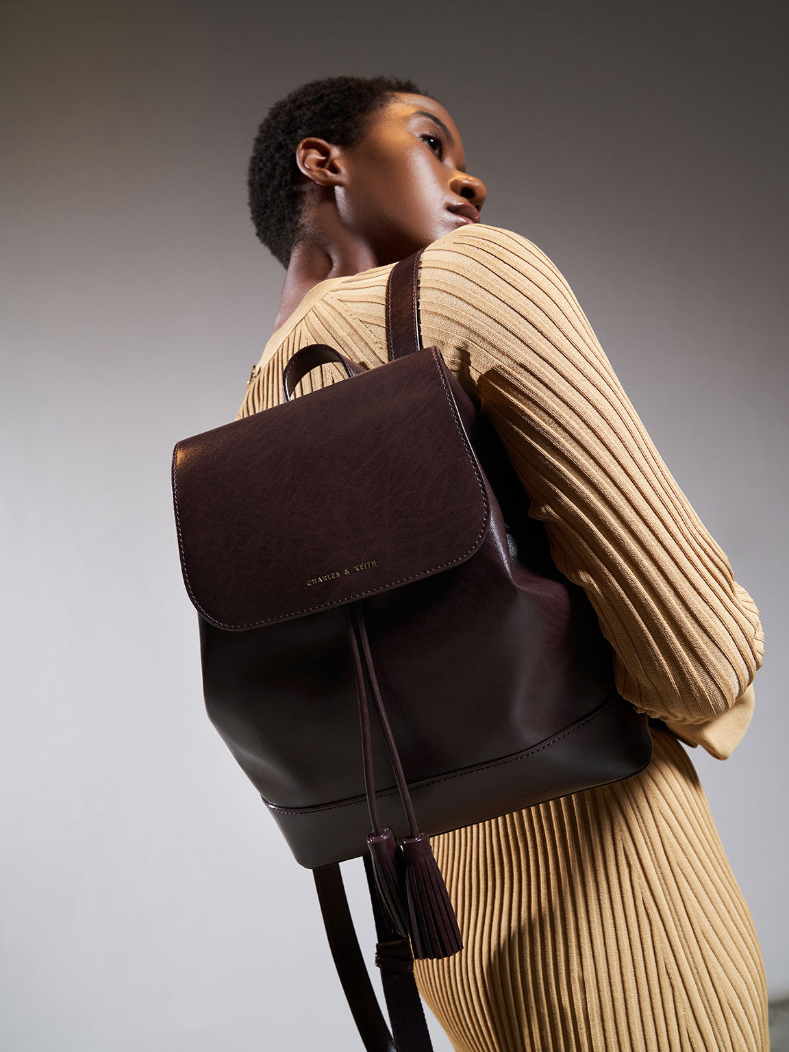 Dark Oak Genevieve Tassel Backpack CHARLES KEITH International