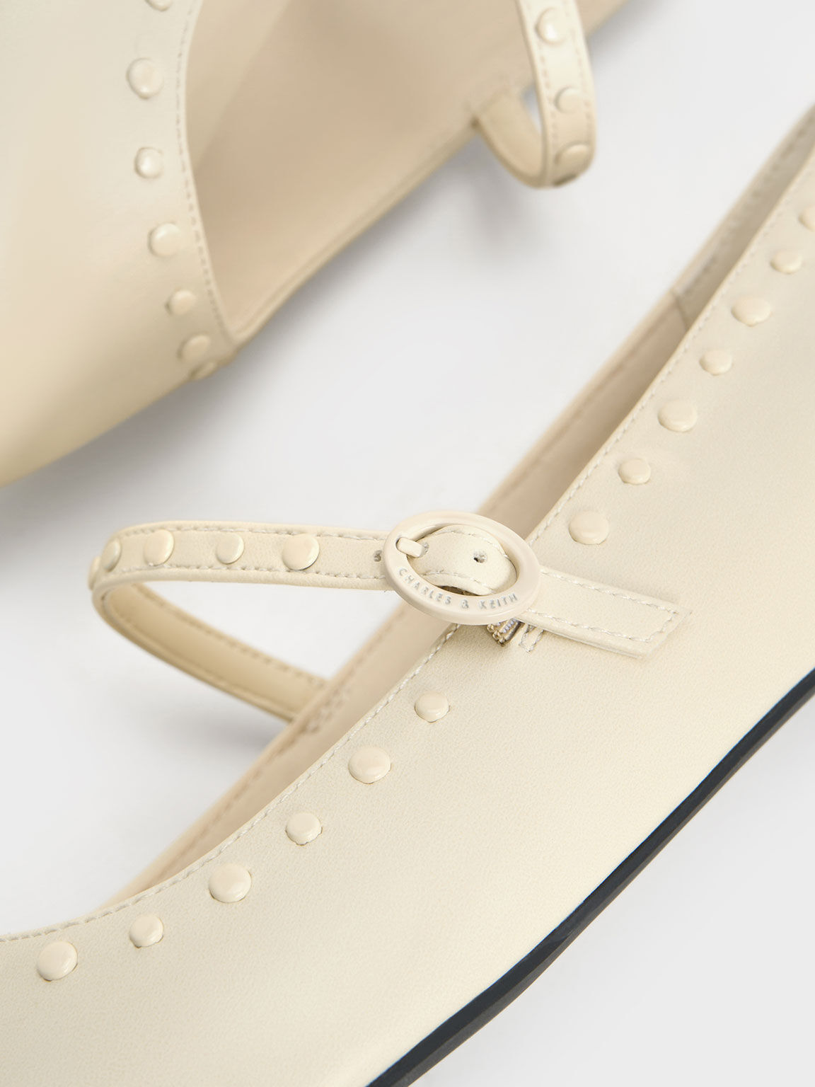 White new arrivals studded flats