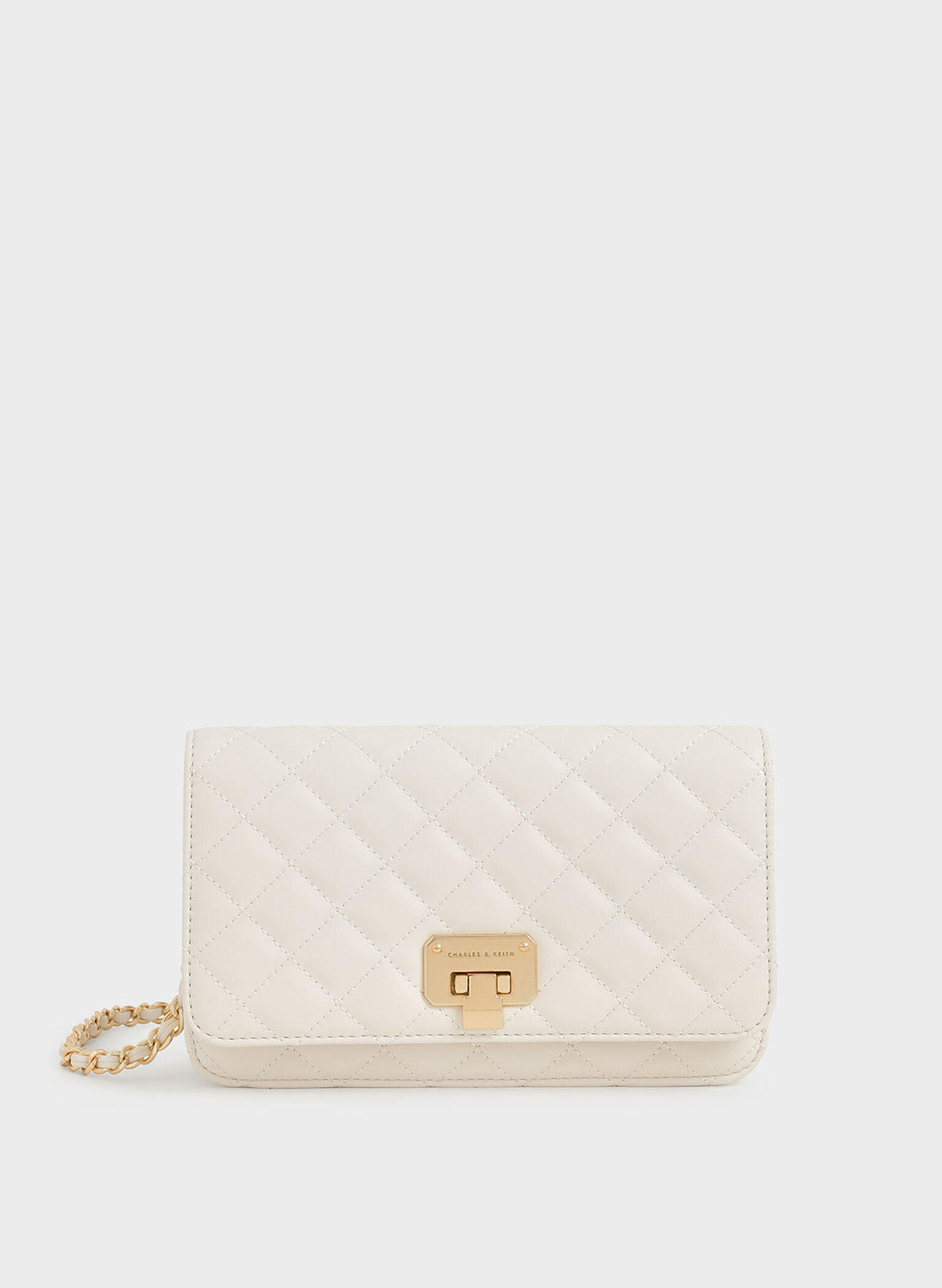 Cream Quilted Push-Lock Clutch - CHARLES & KEITH US