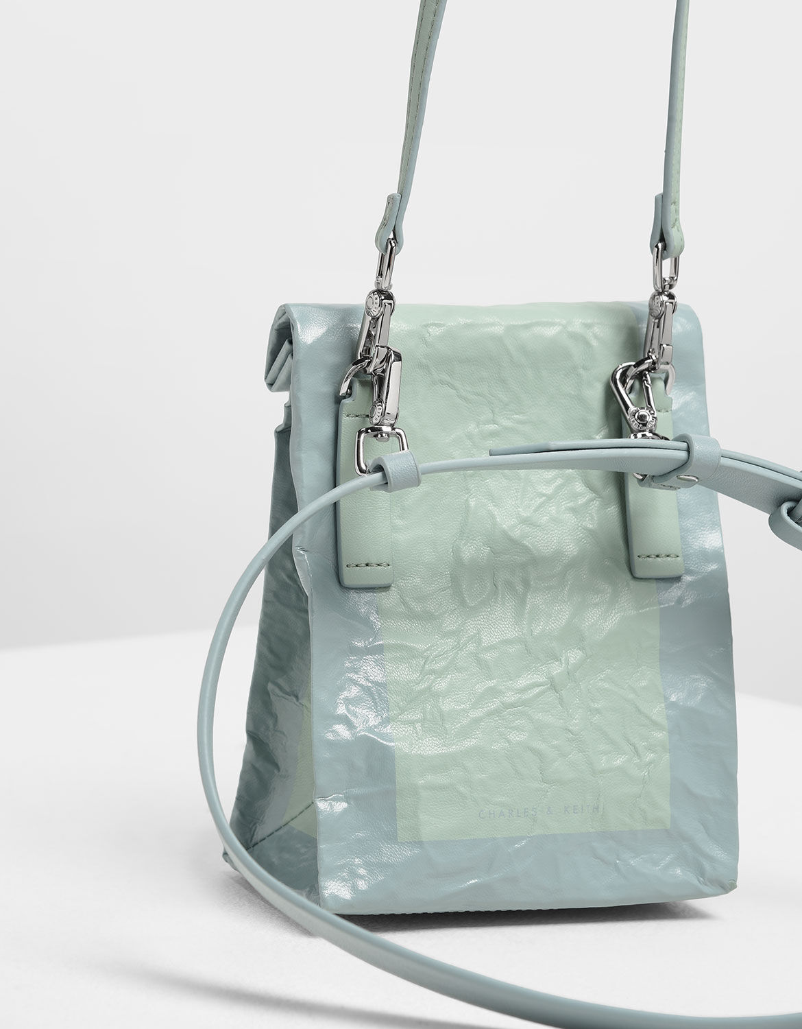 charles and keith paper bag clutch