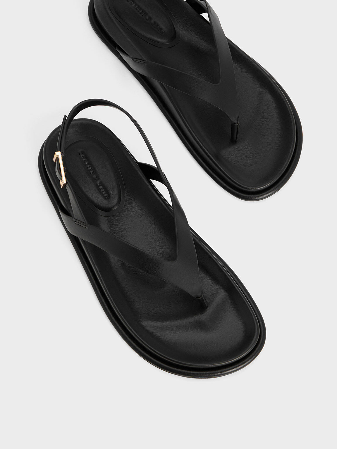 All black thong top sandals
