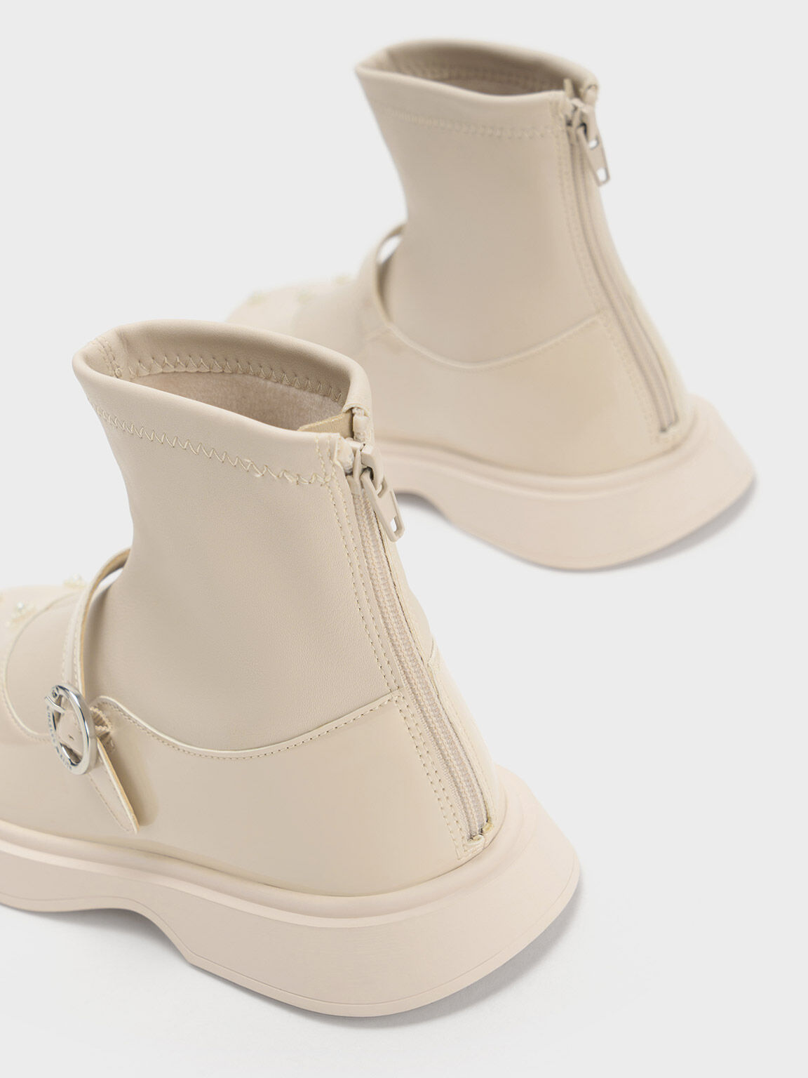 Cream patent boots hot sale