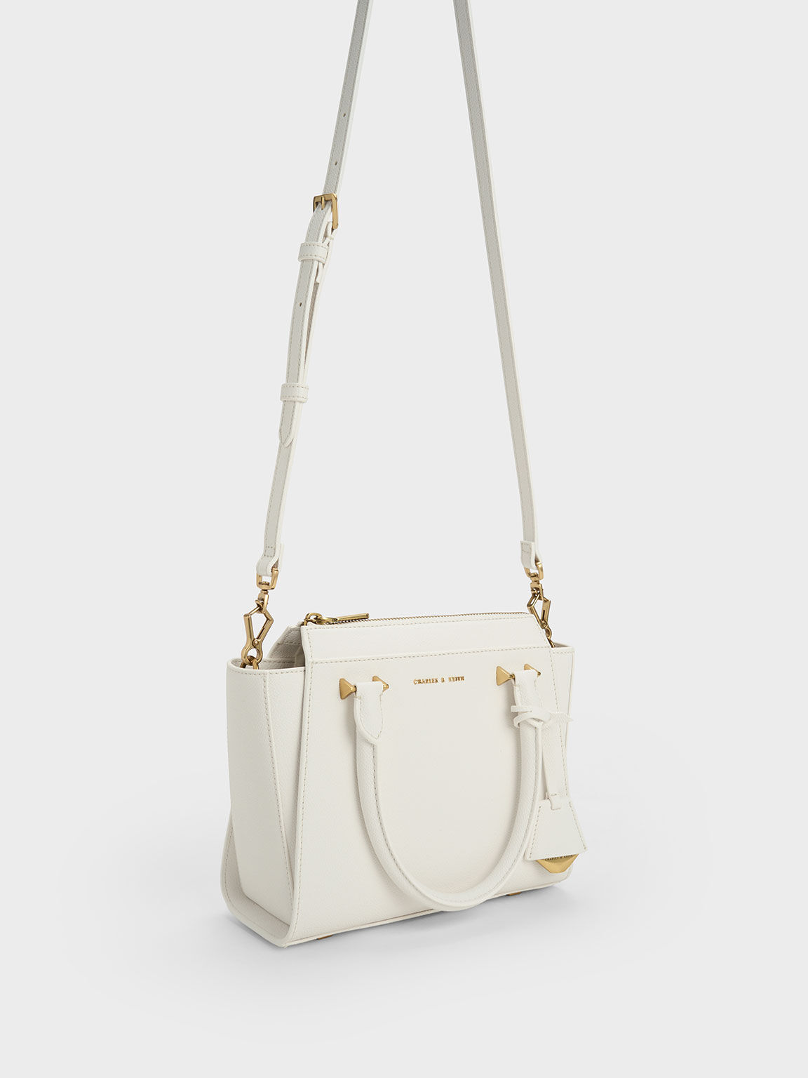 Charles and keith best sale trapeze bag price