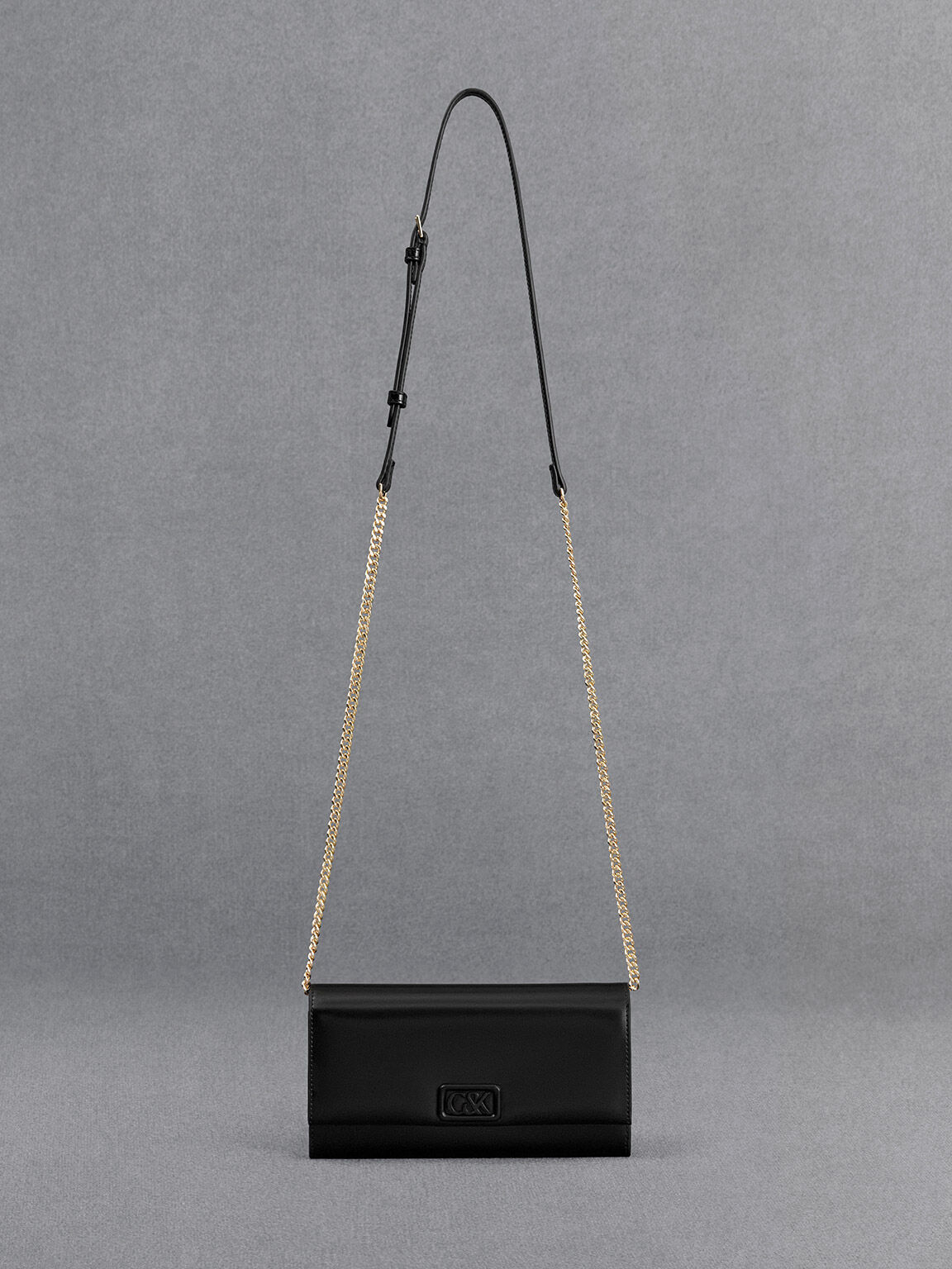 Black wallet purse with shoulder strap top