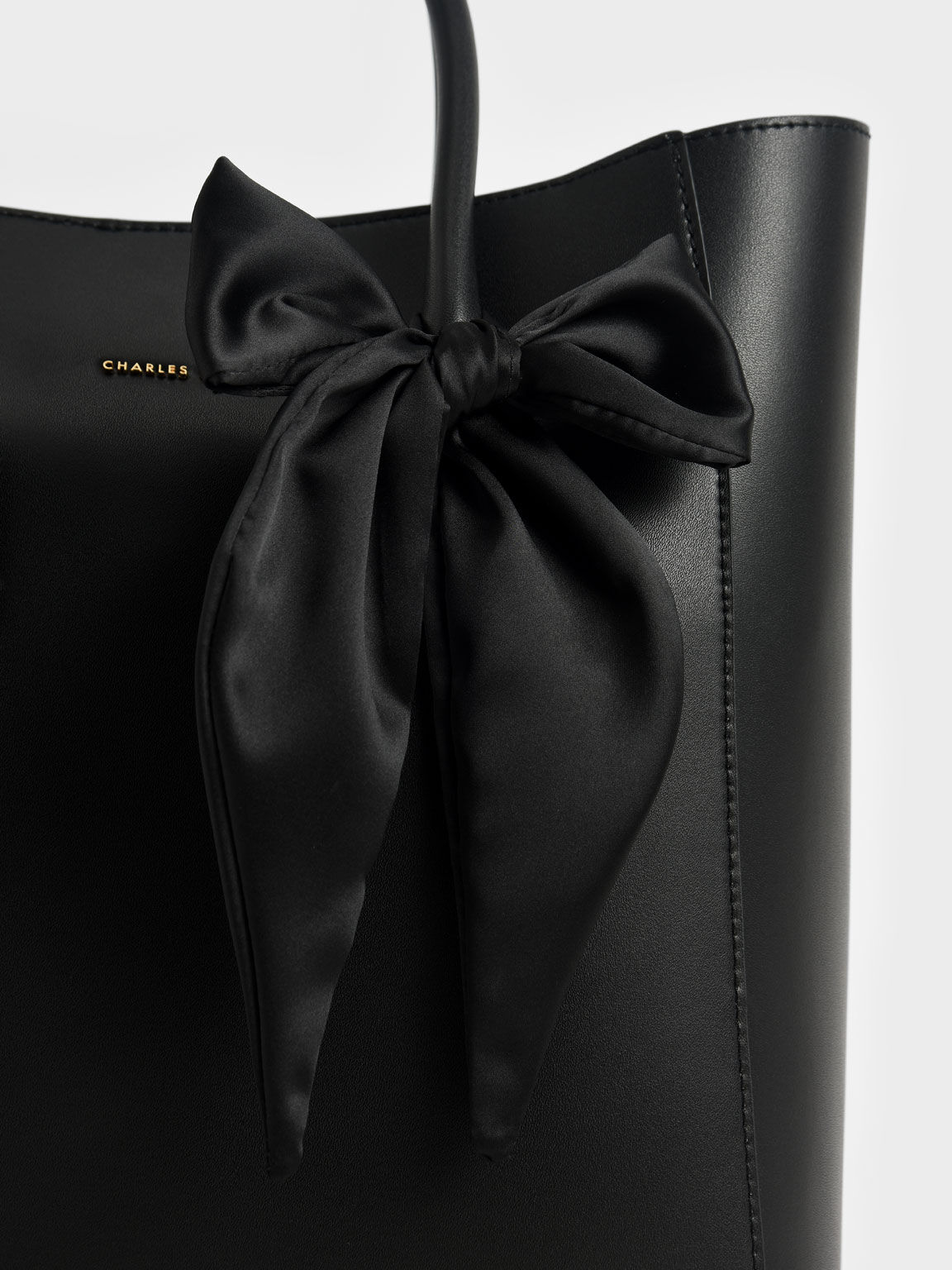 charles and keith bow bolsa