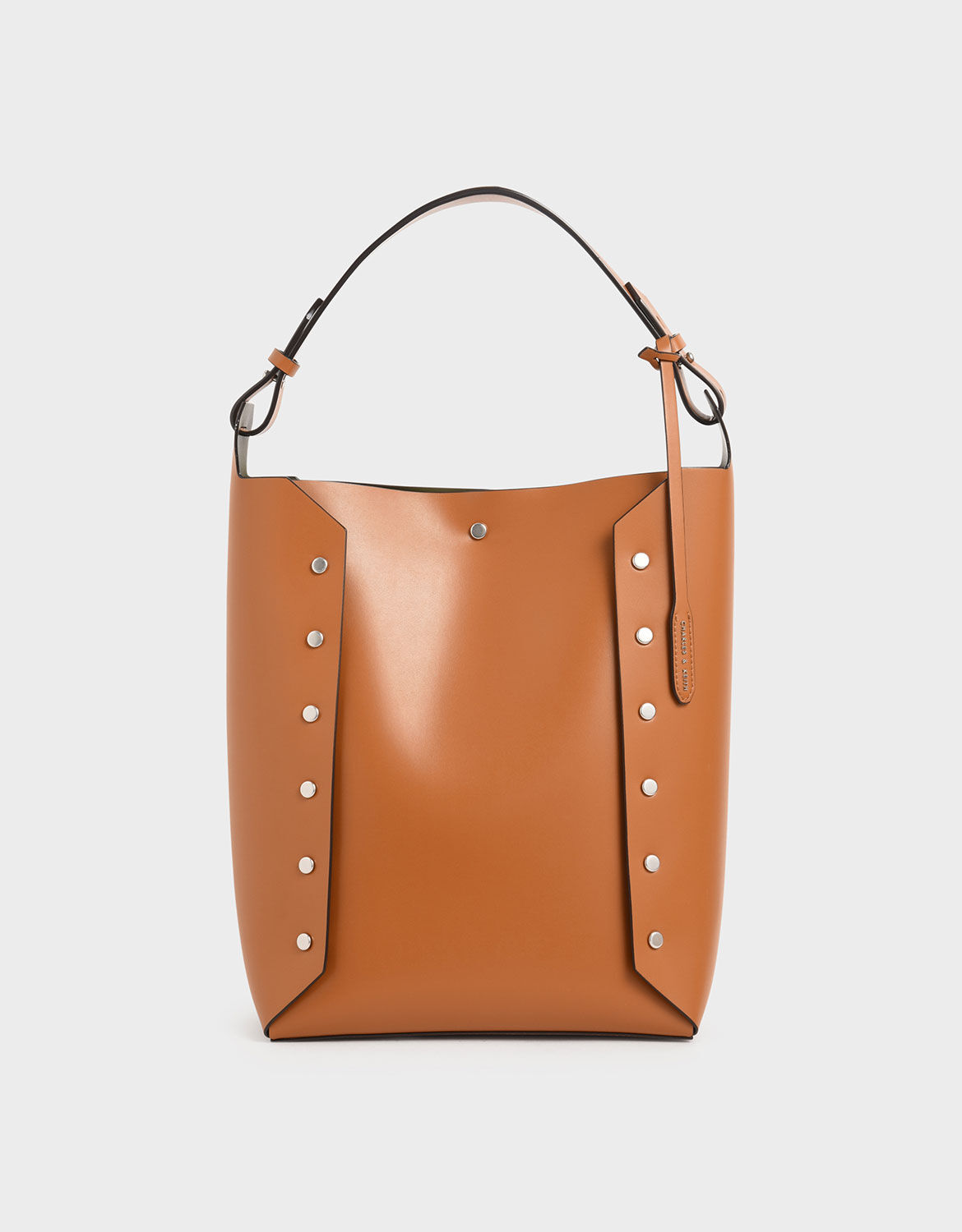 reversible studded tote bag