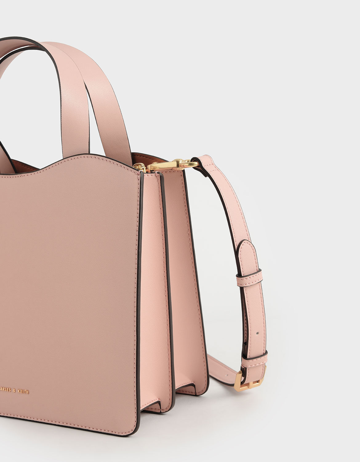 charles and keith pink fur bag