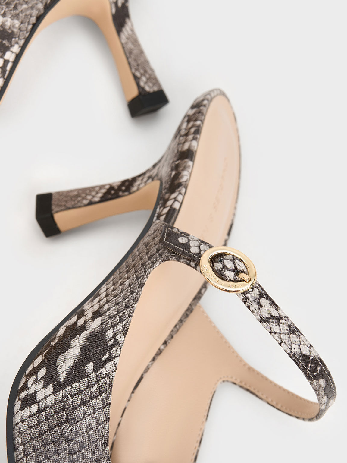 Snakeskin heeled best sale mules