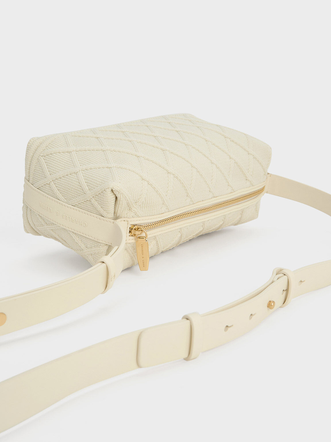 Cream messenger sales bag