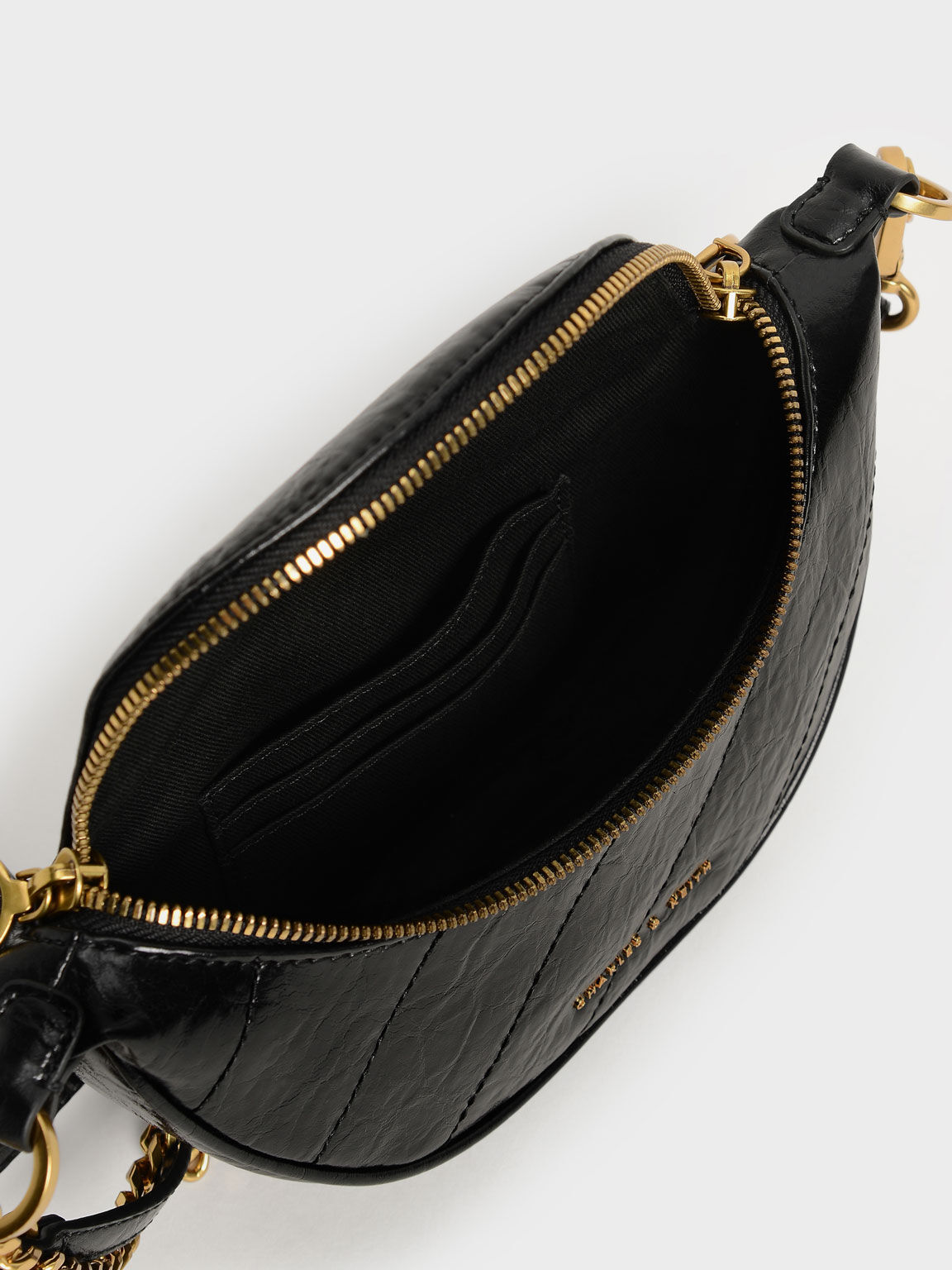 Charles and keith half moon clutch deals
