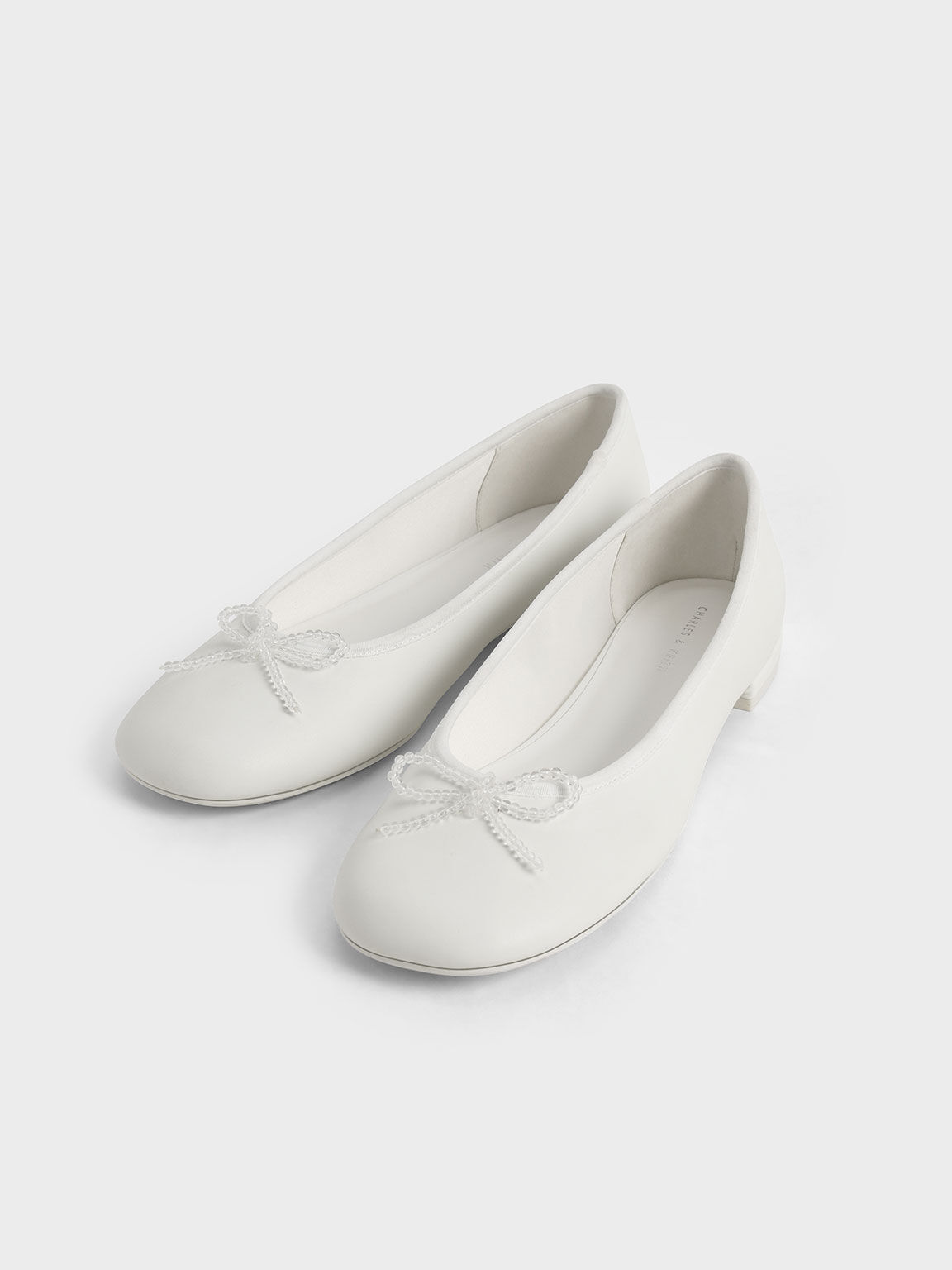 White Bead Embellished Bow Tie Ballerina Flats CHARLES KEITH