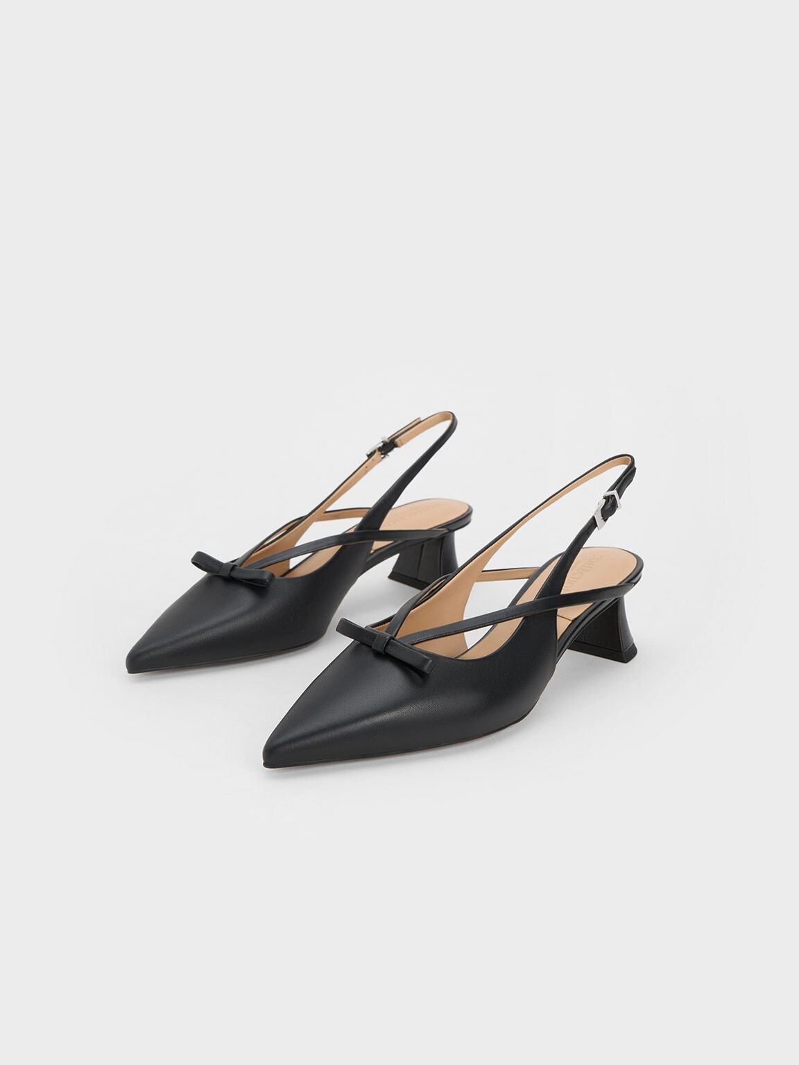 Bow slingback deals pumps