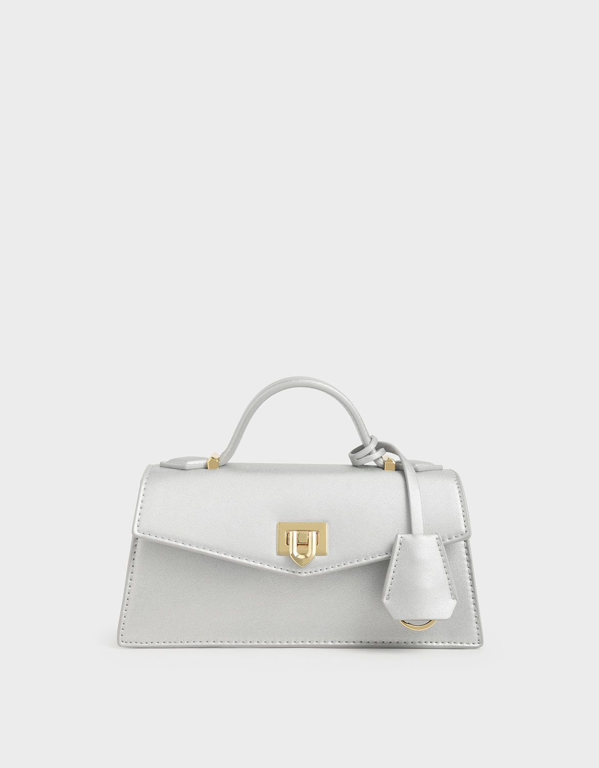 top handle trapeze bag