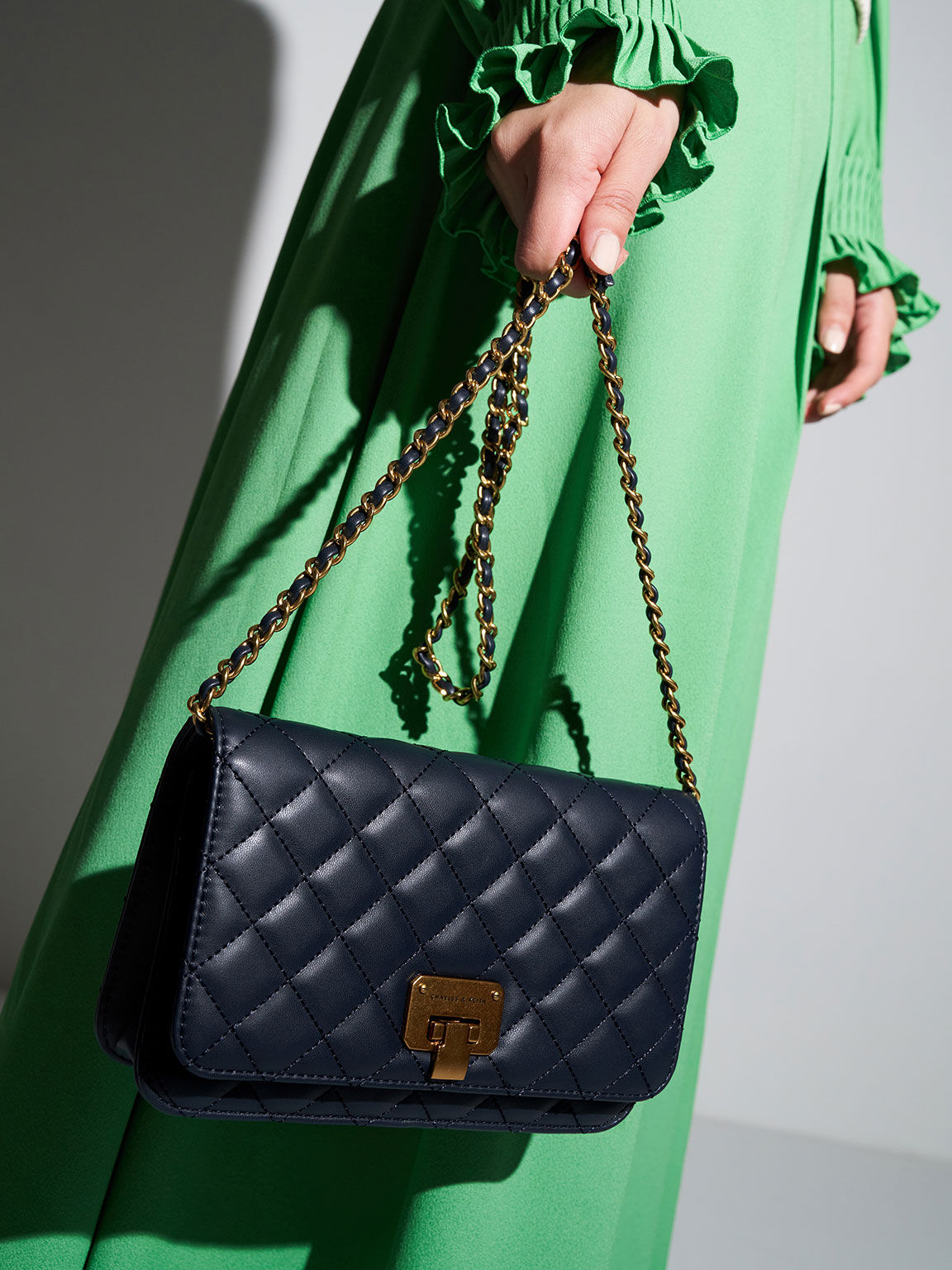 Navy Quilted Push Lock Clutch CHARLES KEITH US