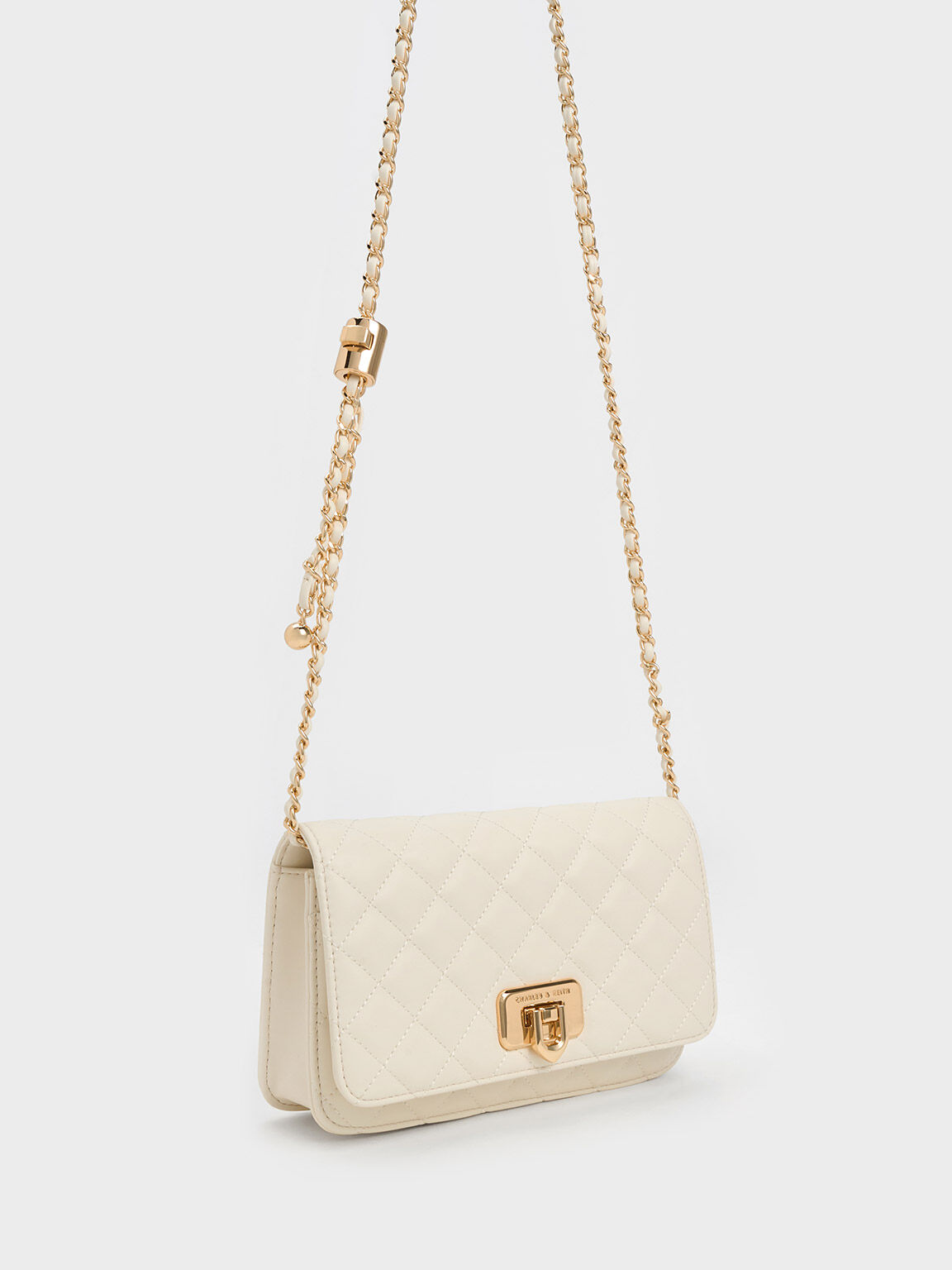 Quilted clutch online charles and keith
