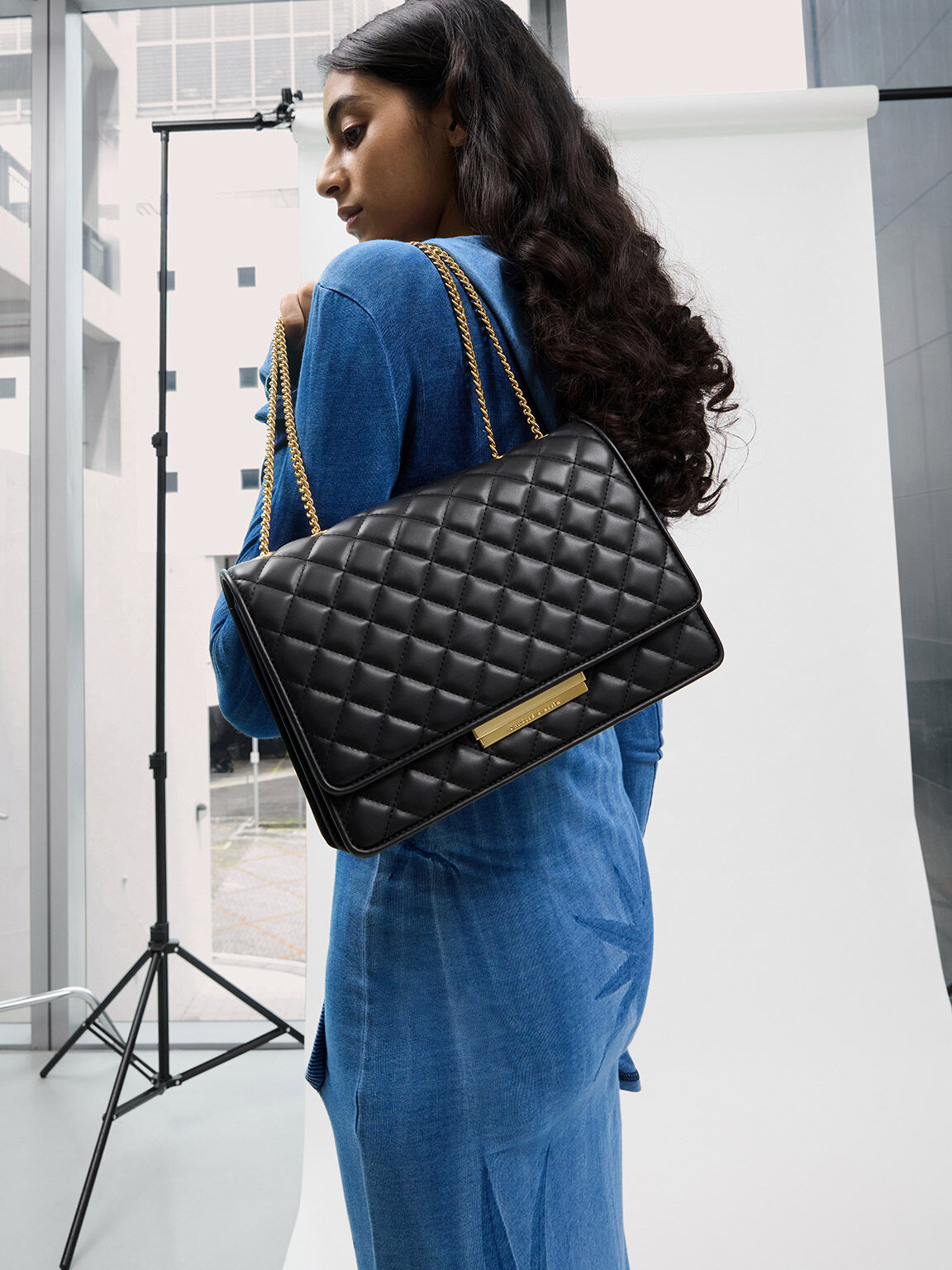 Black quilted store side bag