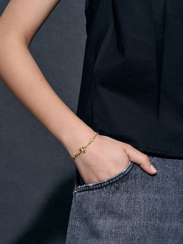 Bracelet avec ornements cristaux et &eacute;toiles, Or, hi-res