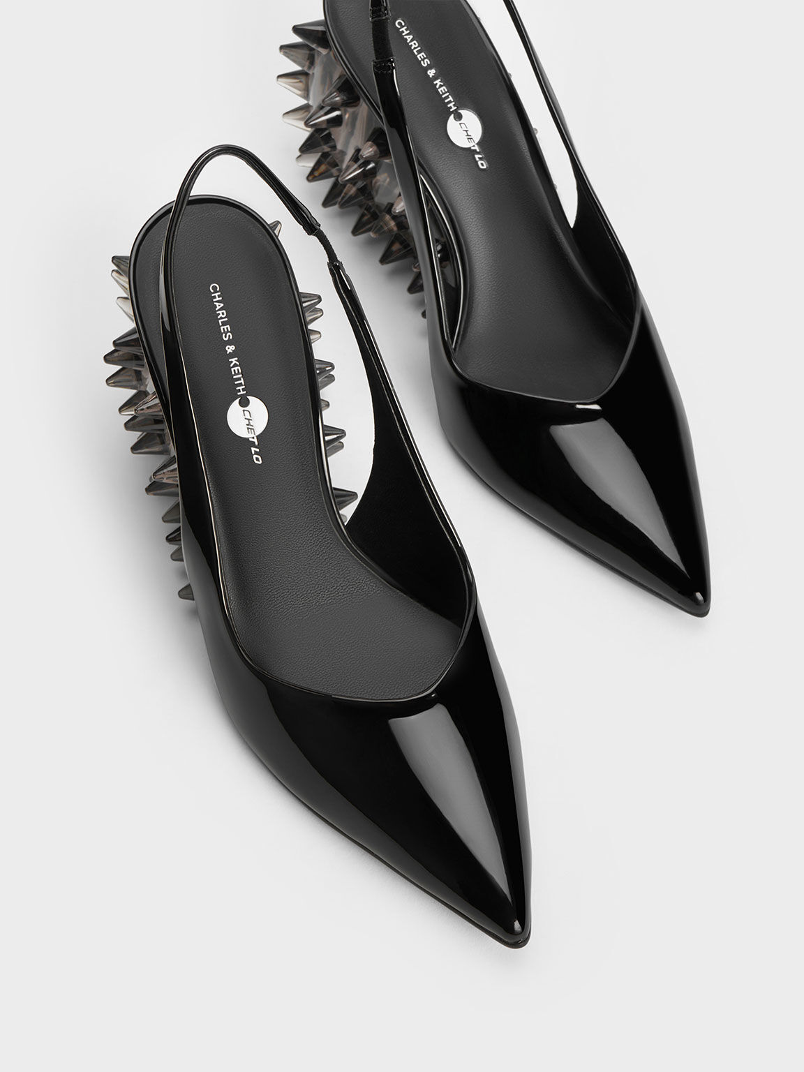 Black spiked high heels sales