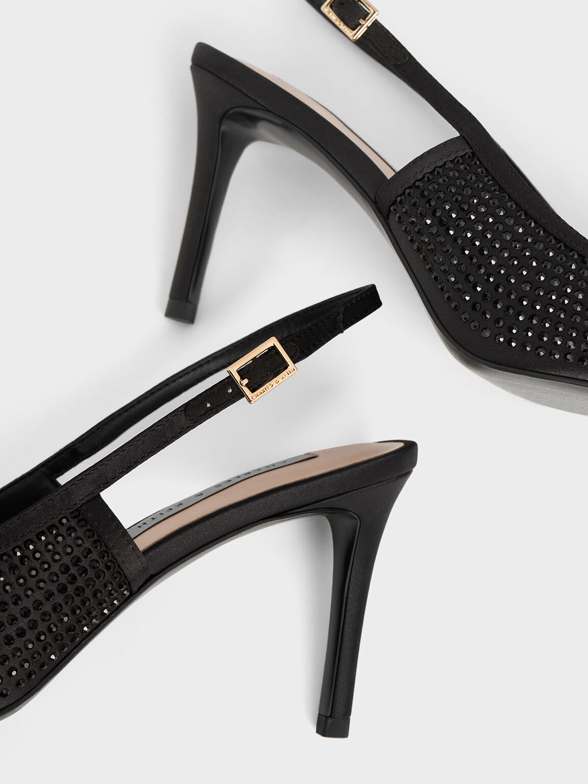 Black satin heels with rhinestones top
