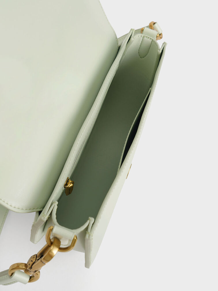 CHARLES & KEITH - Our highly popular Gabine saddle bag is back this season  in new colours, including dark green and mustard. Shop now: Gabine saddle  bag -  (Credit: Pingping, @pingvibes) #