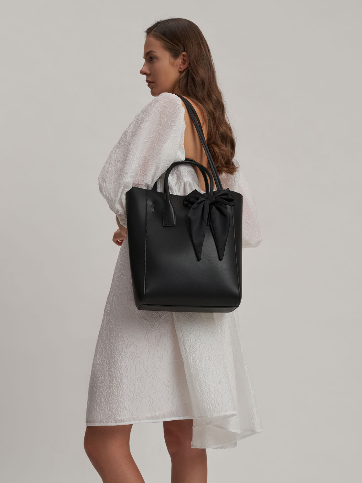 charles and keith bow bolsa
