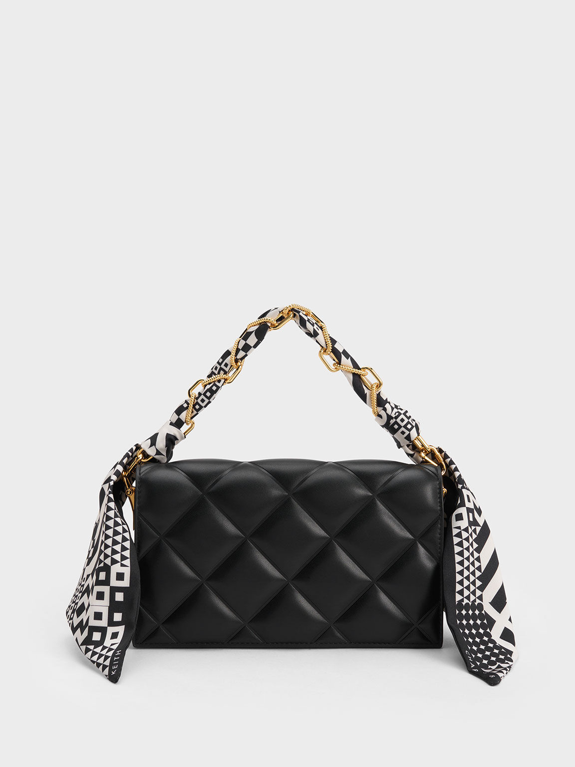 Charles & keith new arrivals quilted clutch