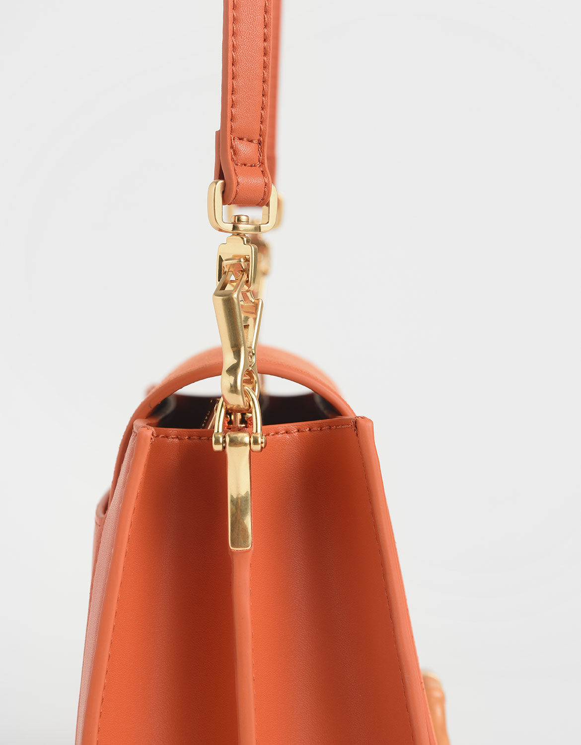 charles and keith orange sling bolsa