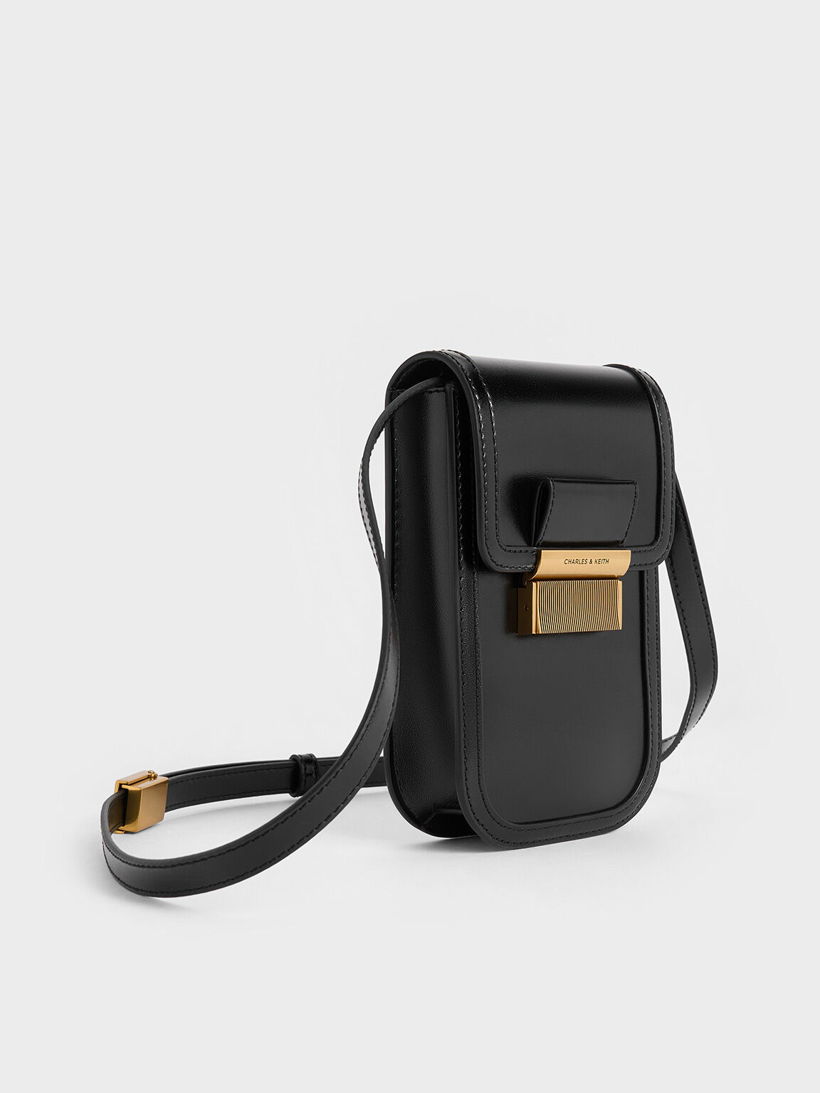 Black Mini Charlot Elongated Crossbody Bag CHARLES KEITH OM