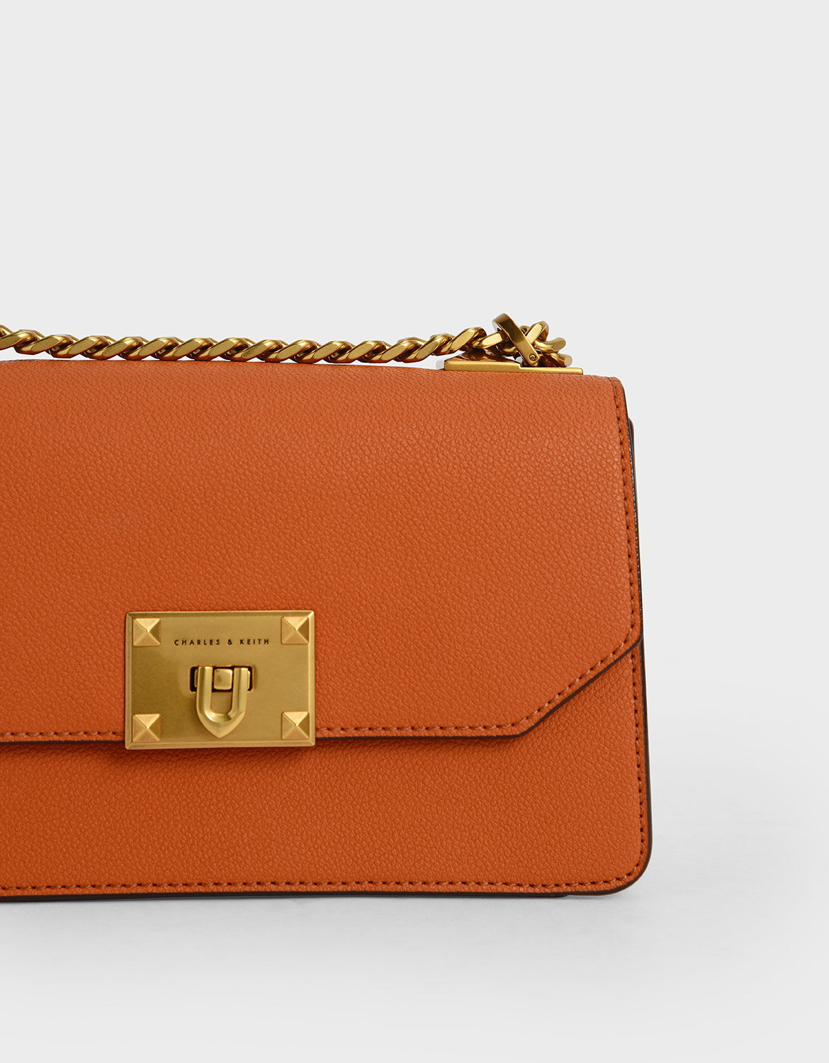 charles and keith orange sling bolsa