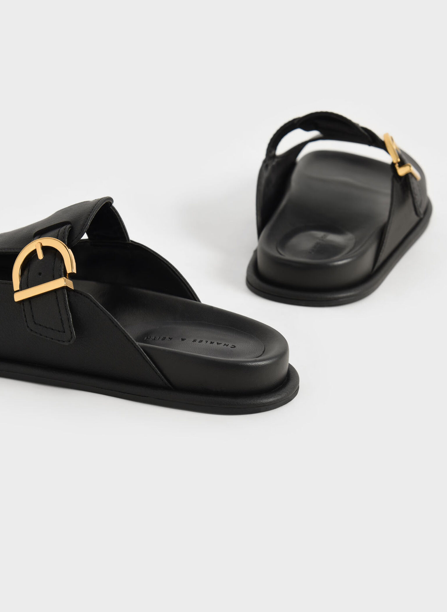 Black Cut-Out Buckled Slides - CHARLES & KEITH US