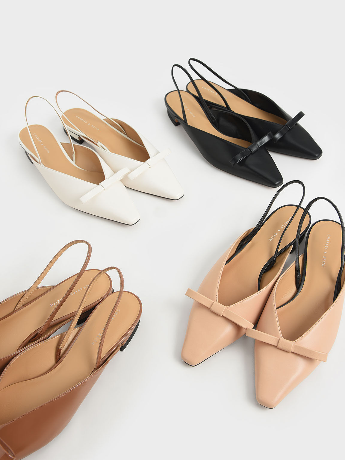 pointed block heel ankle boots