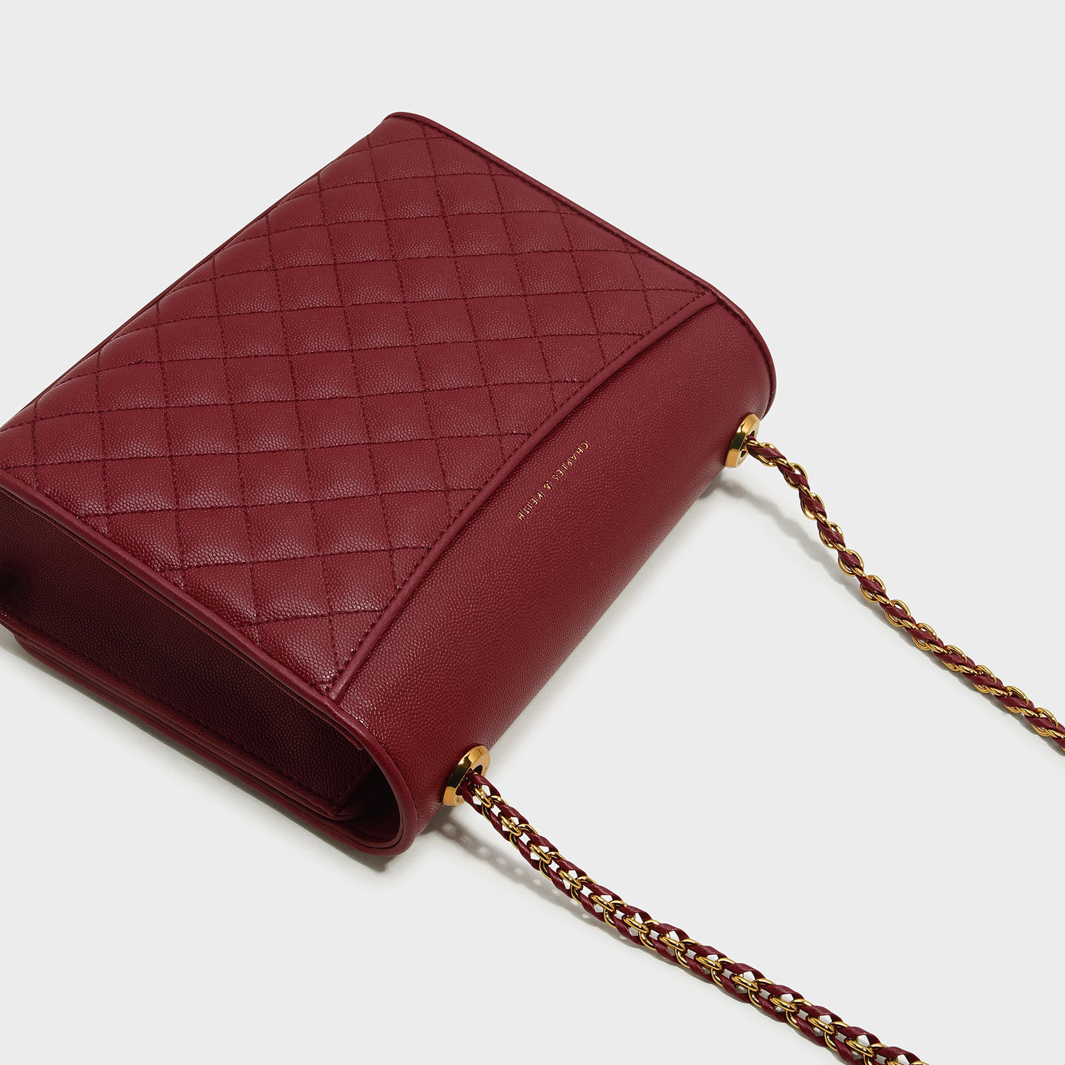Charles and keith hot sale red sling bag