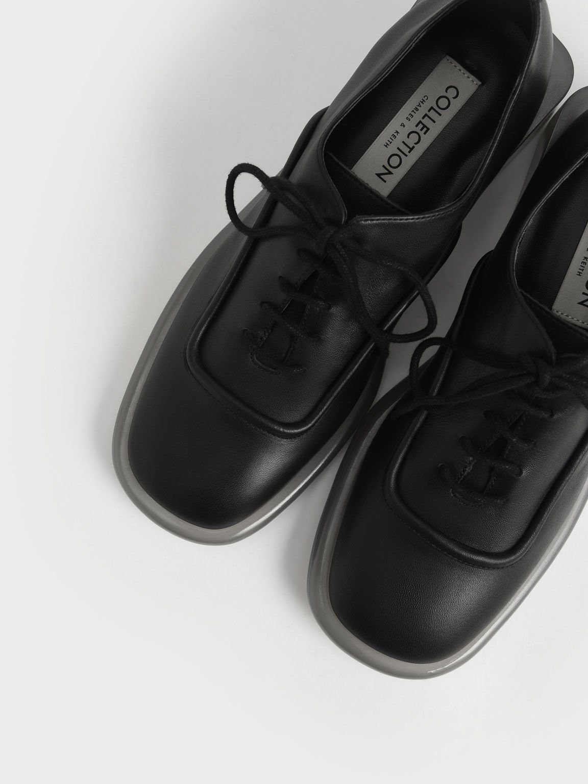 Black Fleur Leather Oxfords - CHARLES & KEITH International