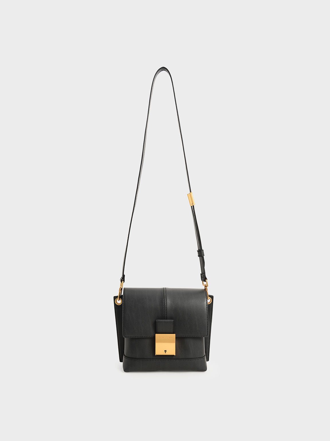 Circular push lock crossbody bag clearance