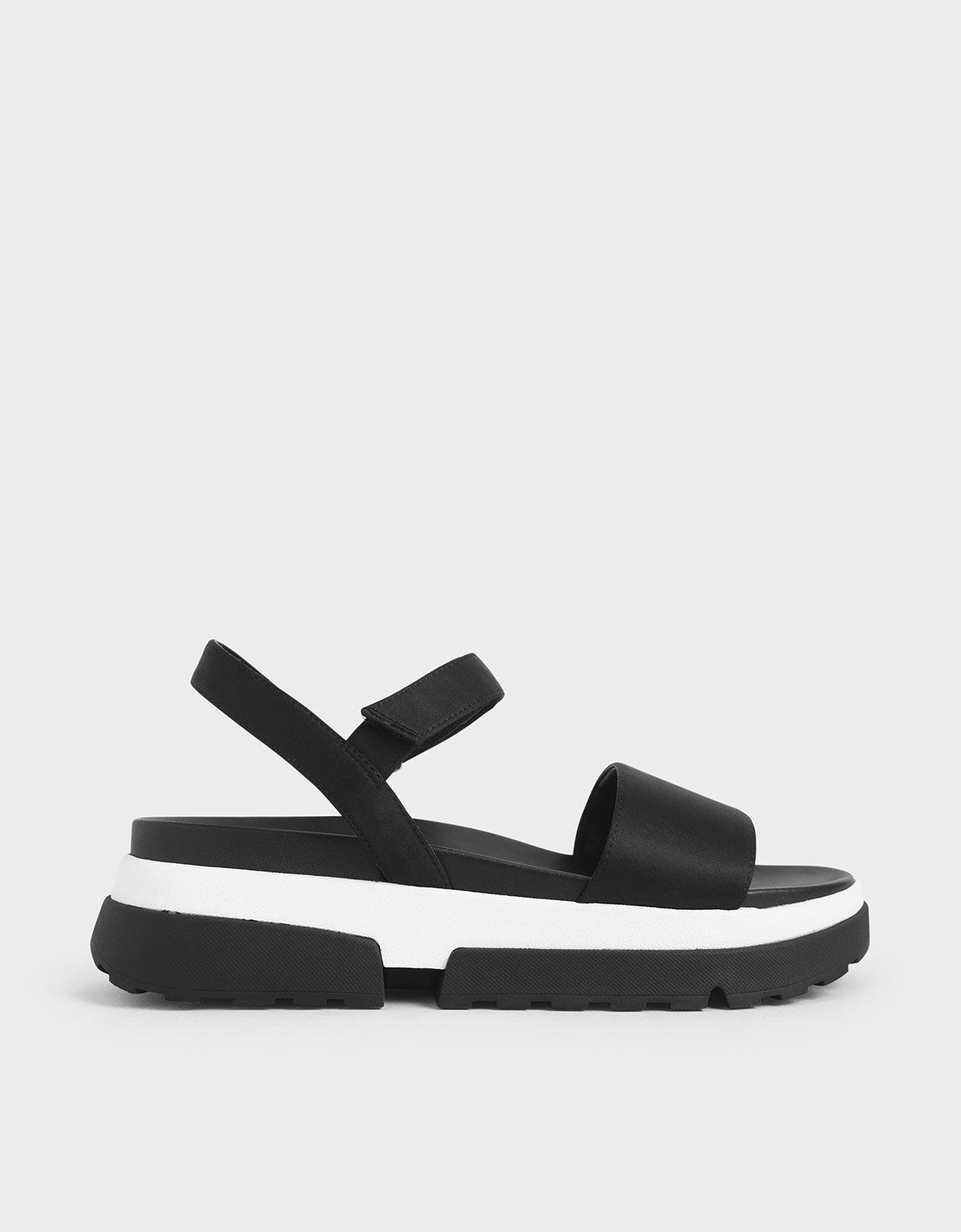 black sole sandals