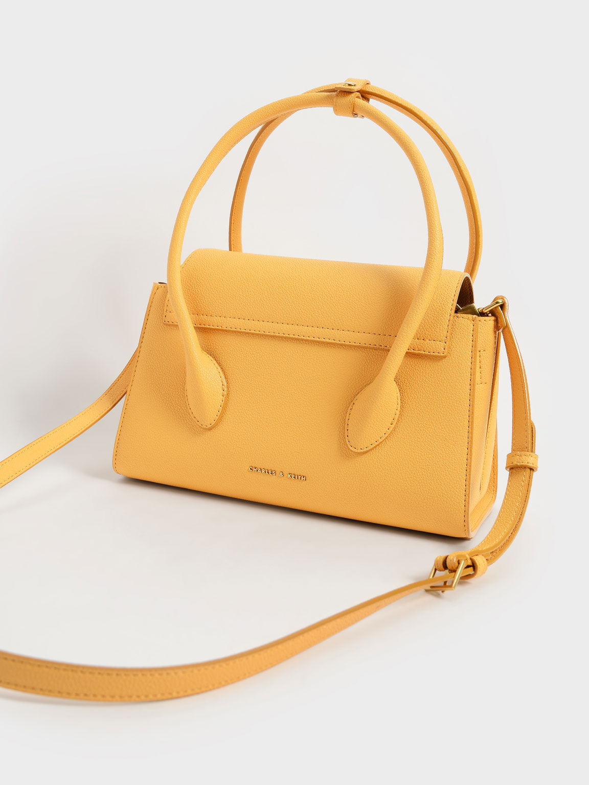 charles and keith mustard bolsa