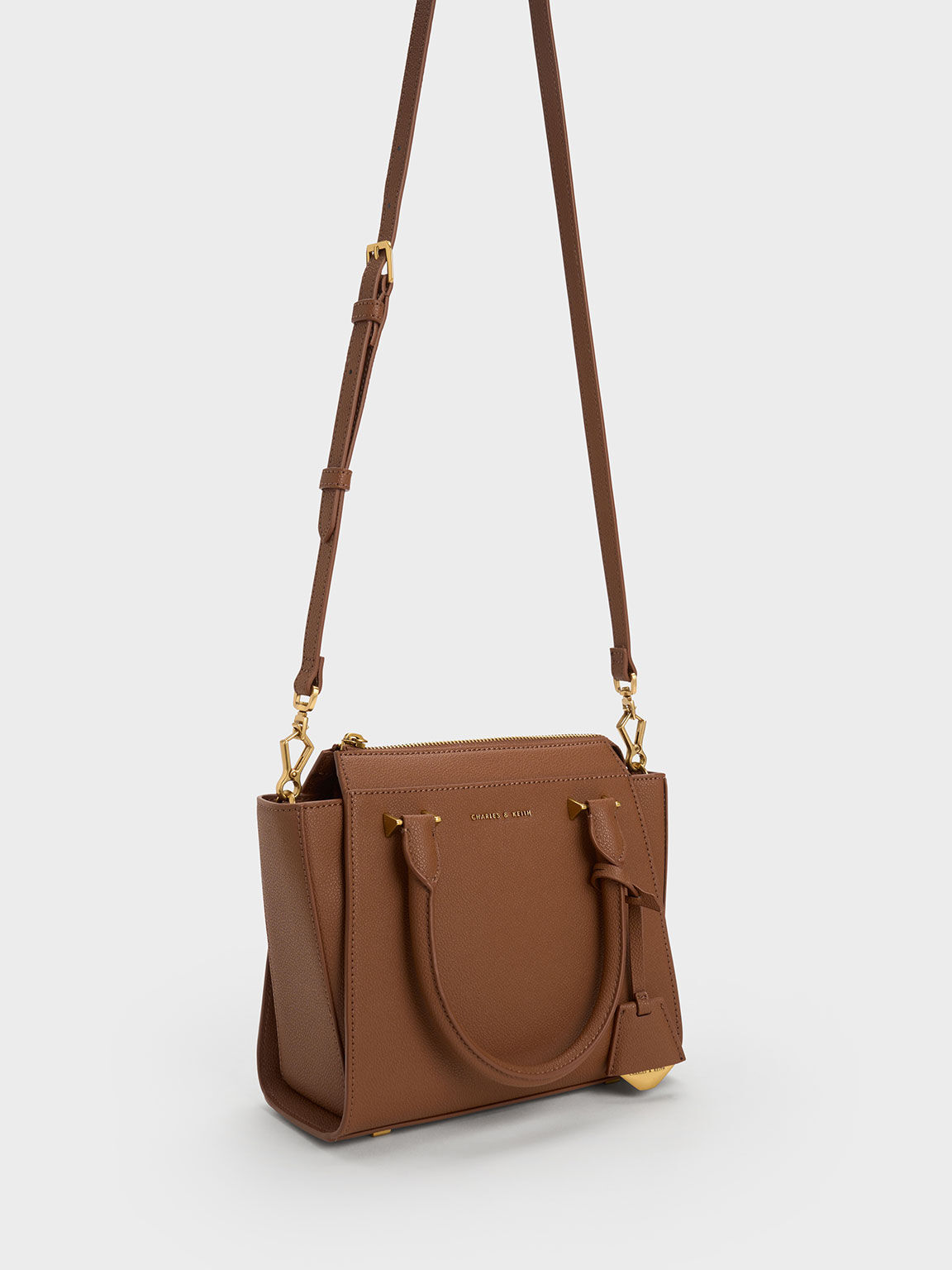 Charles & keith online structured trapeze bag