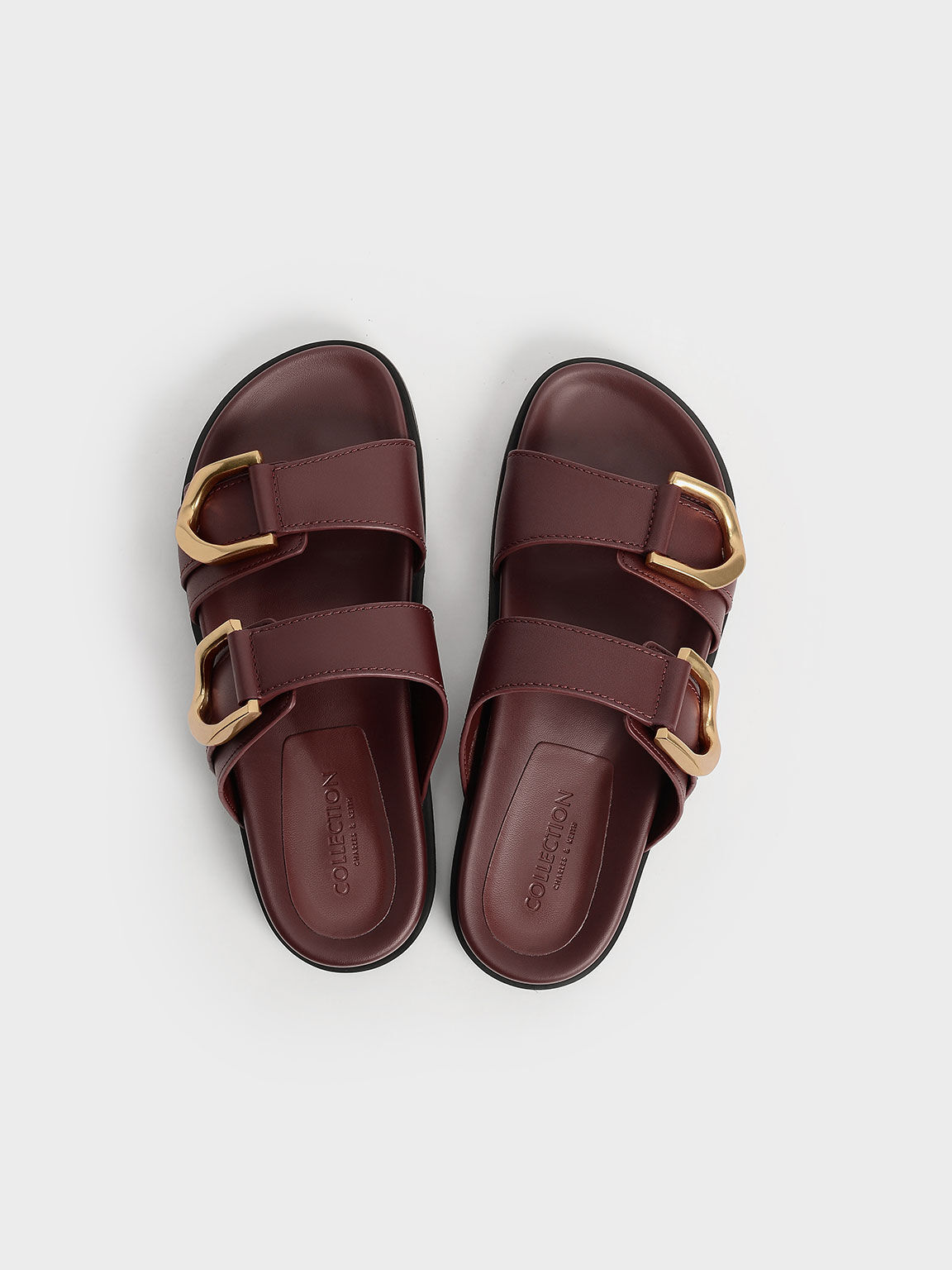 buckled leather slides