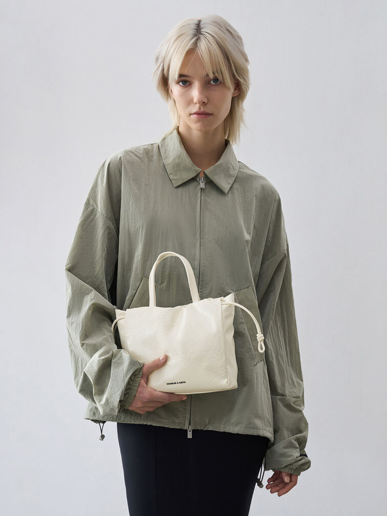 Minibolso tote Bethel acabado arrugado con cierre de cordón, Crema, hi-res
