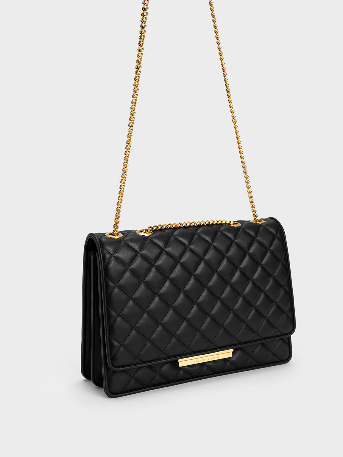 Black Push-Lock Quilted Crossbody Bag - CHARLES & KEITH SG
