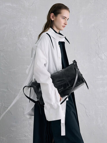Bolso cruzado Bryna con paneles y tiras con ojales, Noir, hi-res