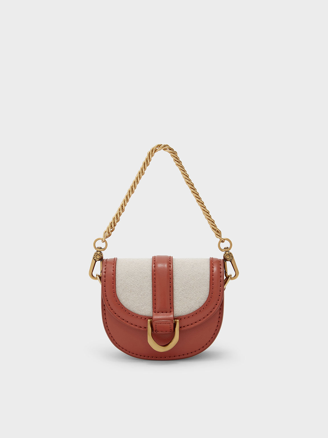 Charles & Keith Micro Gabine Saddle Bag in Natural