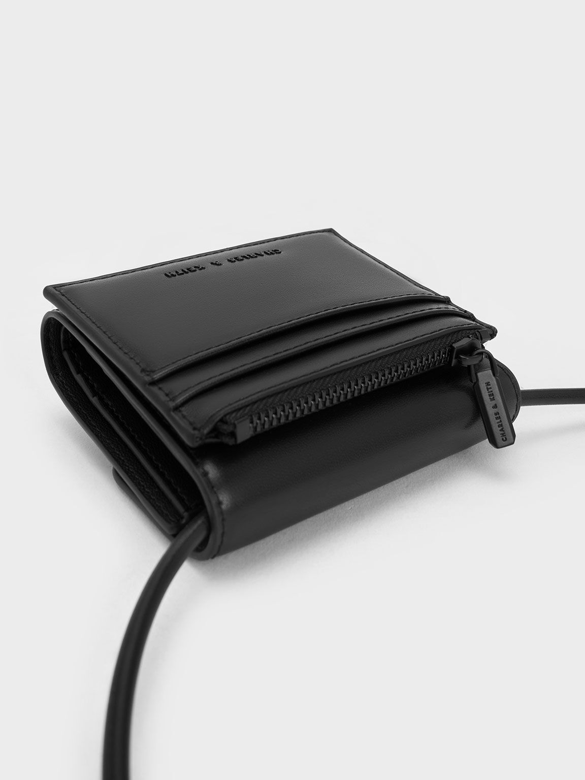 Black Metallic Accent Short Wallet - CHARLES & KEITH US