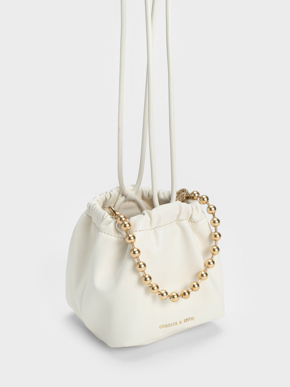 White Aldora Beaded Handle Bucket Bag CHARLES KEITH SG