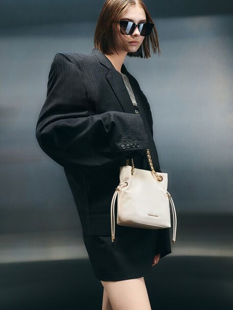 Bolso bandolera Arya con doble asa y correa trenzada, Crema, hi-res