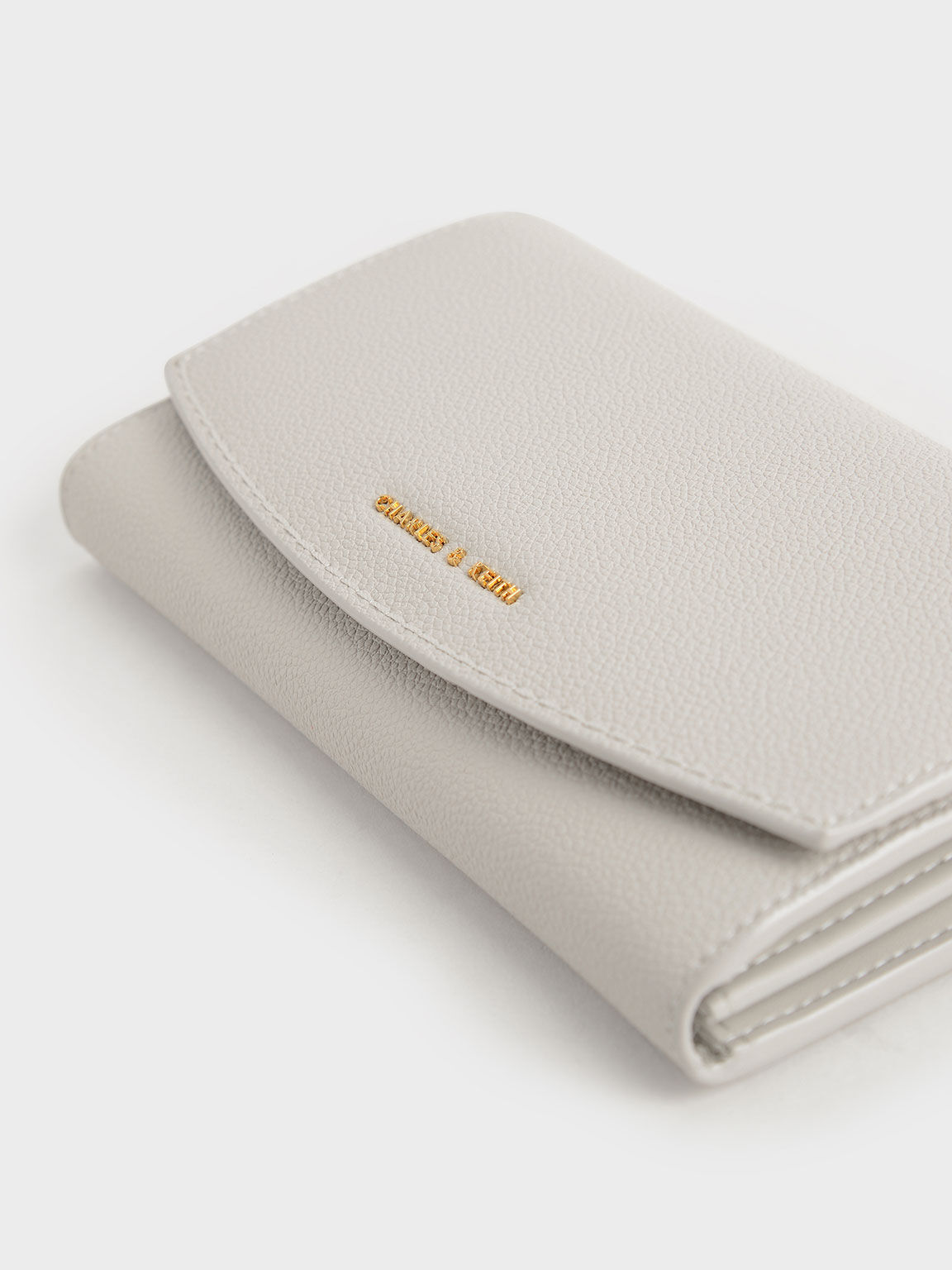 Light Grey Briony Curved Flap Long Wallet CHARLES KEITH PH