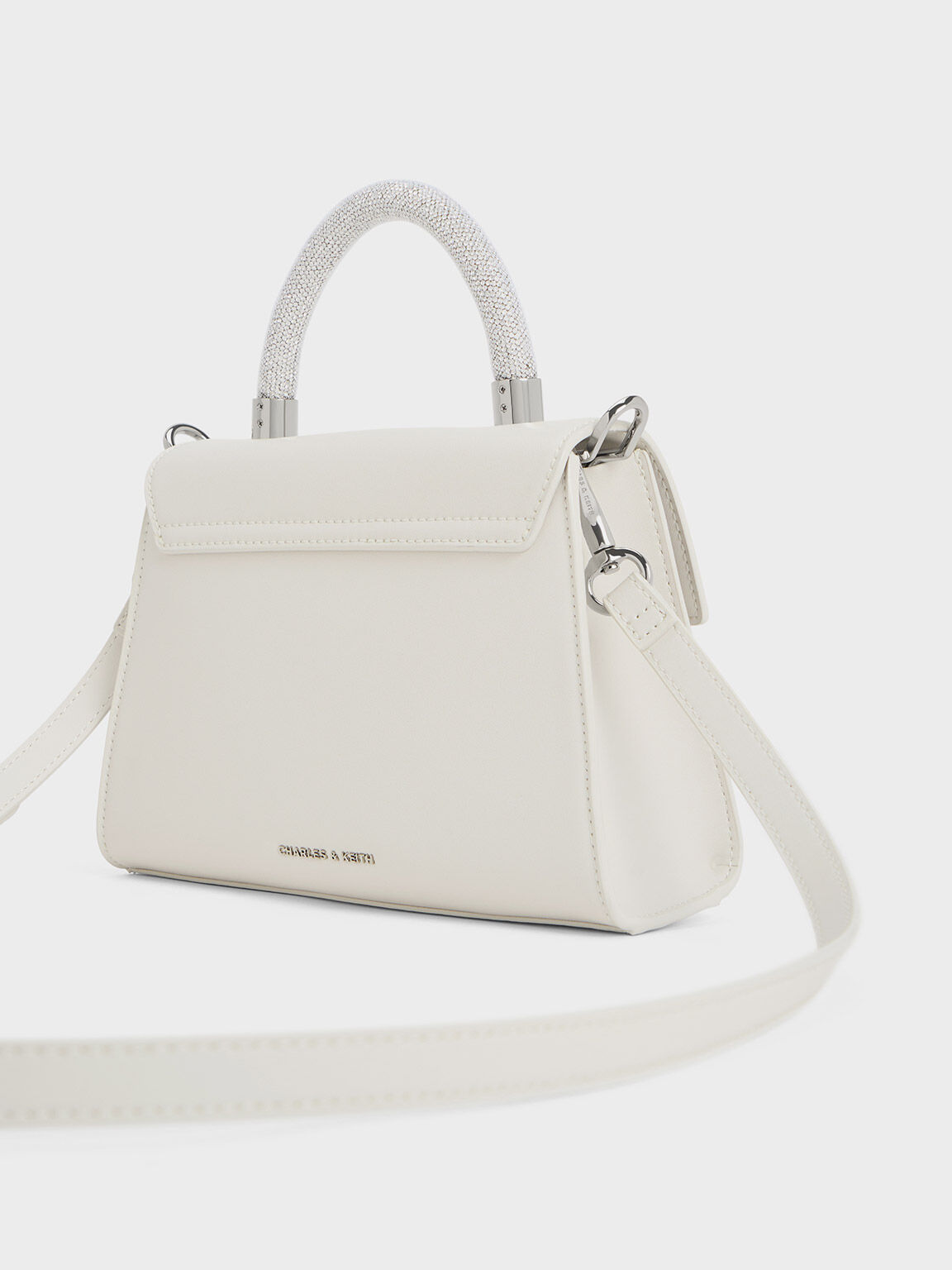 White top embellished bag