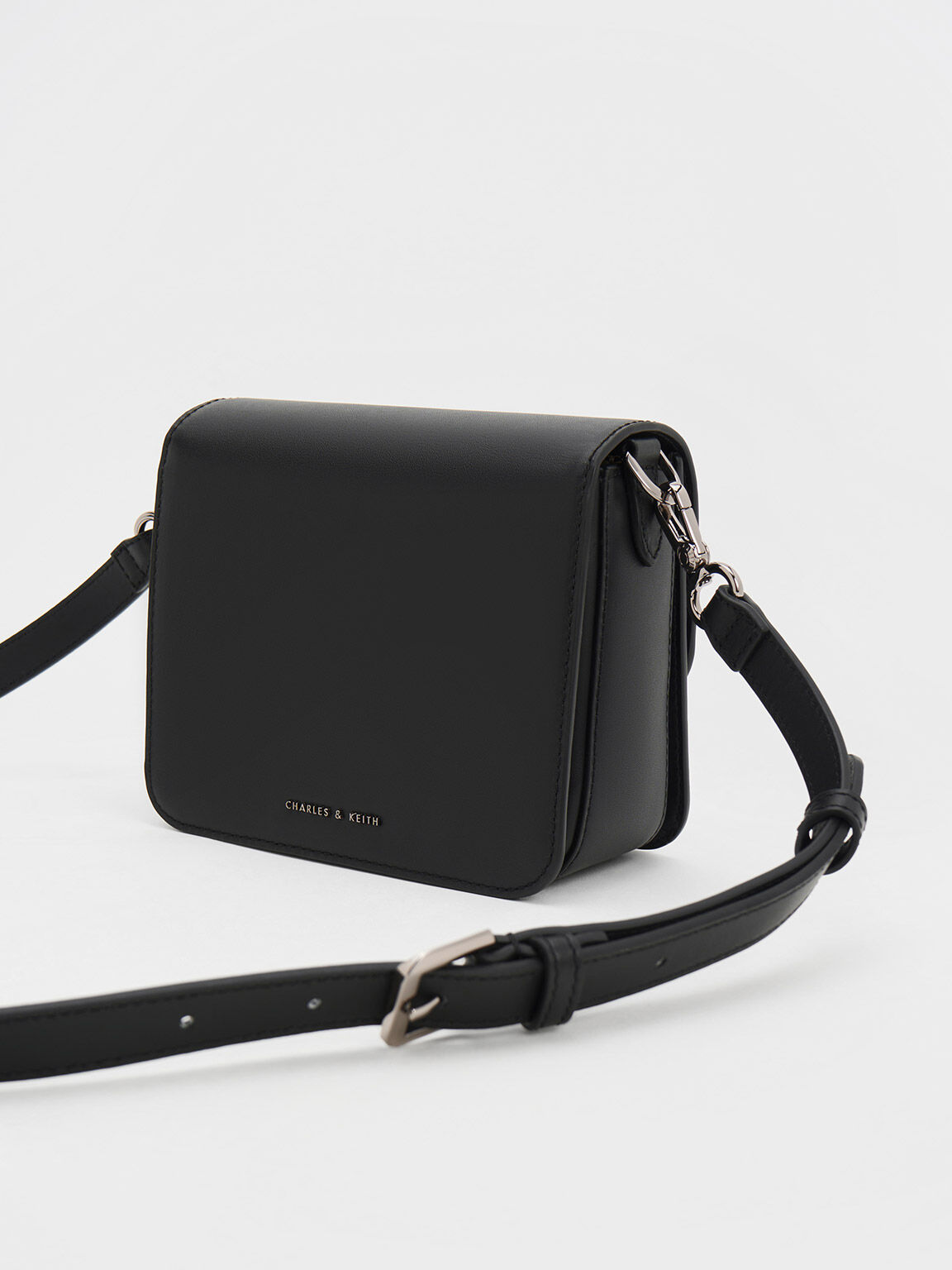 Charles and keith black crossbody bag hot sale